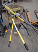 Heavy duty wheelbarrow with garden maintenance tools