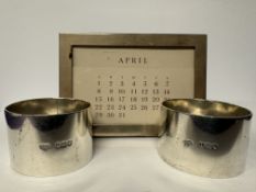 Pair of Silver Napkin Rings & A Perpetual Calender Marked 'Inman Sterling'