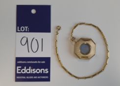 Asprey 9 carat gold cigar cutter, engine turned decoration with unmarked 9 carat chain, 9 carat gold