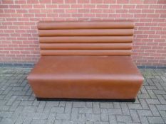Bench Seat in Tan Faux Leather. Damage to upholstery shown in photos. Width 150cm, depth 85cm, seat