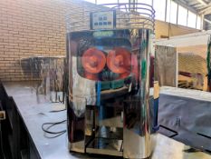 Trimco commercial juicer.