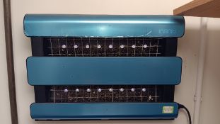 Infiniti LED Insect-o-cutor – Located in back of house corridor