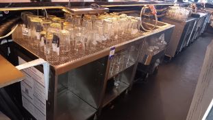 Stainless steel bar section with ice well, sink, bottle shelf and shelving under (purchasers’