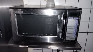 Sharp R-21ATP commercial 1,000w microwave, serial number 210260505 to wall mounted shelf – Located