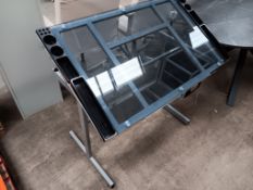 Adjustable angle drawing table