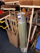 Quantity of various bristle brushes and mop/brush handles