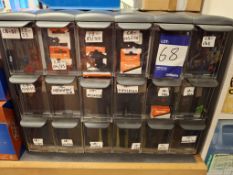 18 compartment storage unit with quantity of Makita carbon brushes