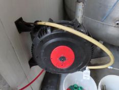 2x Retractable hose reels - One missing the wall bracket