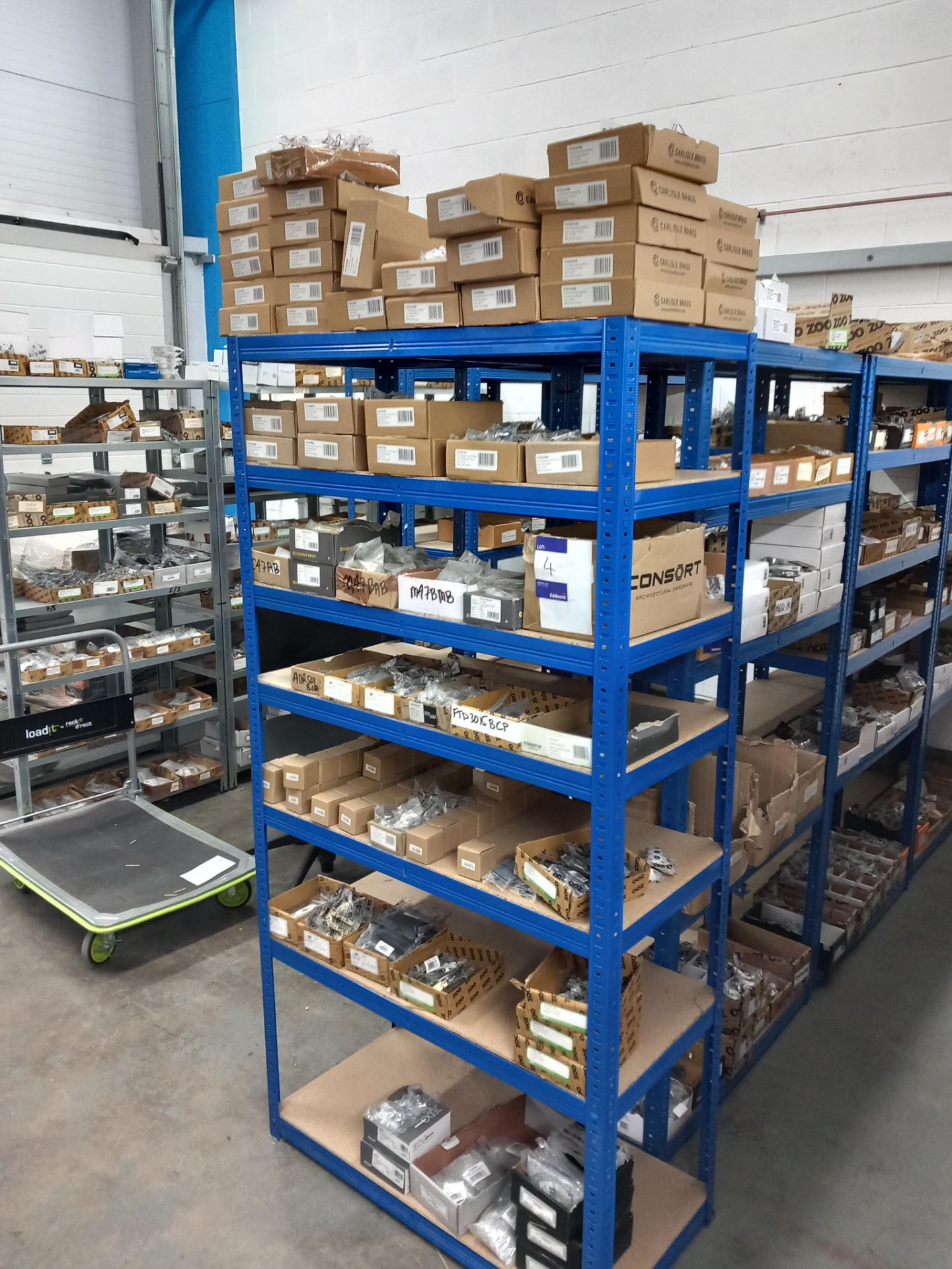 Assortment of cabinet furniture to include cabinet knobs, pull handles, magnetic catches, flush