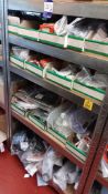 Assortment of KTM parts/accessories to shelving bay to include various clamps, silencer brackets,