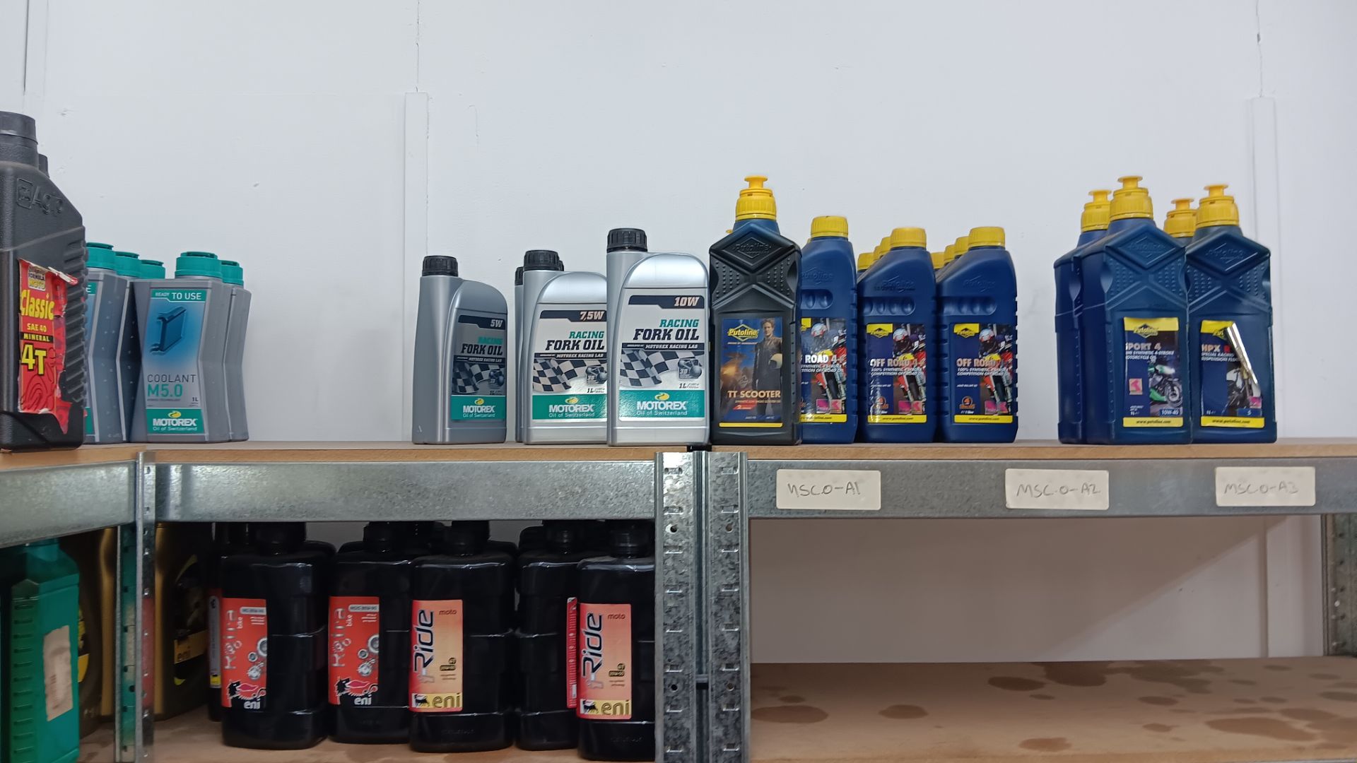 Large quantity of various engine oils to include Four Stroke oil, Fork oil, Cross Power, coolents, - Image 2 of 10