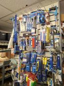 Contents of wall to include knifes, contact adhesives, scrapers, cords, diamond discs, chisels etc.