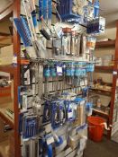 Contents of wall to include large quantity of SDS drill bits, wire wheels, hack saws, trowel, tile