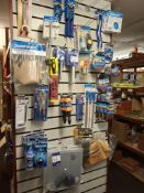 Contents of wall to include grips, wrench, files, mole grips, jointer, sanding pads etc.