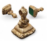 A large 9ct gold fob set with a rectangular green stone approx. 35.4 x 32.4mm, indistinct