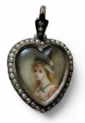 A Victorian gold and seed pearl heart shaped pendant, set with portrait of a young lady wearing a