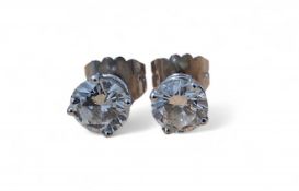 A pair of 18ct white gold diamond earrings, claw set brilliant cut diamonds, colour H, SI 2, total