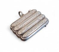 An Edwardian silver novelty vesta case, in the form of a cigar case, gilt interior, chased and