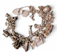 A silver charm bracelet, heart padlock, 30 charms, cottage, top hat, swan, car, trumpet, etc