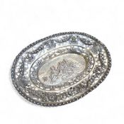 A 19th century German silver oval bonbon dish, the rim decorated in relief with roses, pierced