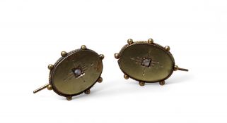 A pair of 15ct gold and diamond chip Etruscan earrings, centrally set with a rough-cut diamond chip,