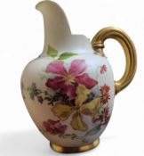 A Royal Worcester flat sided jug, printed and painted with flowers and foliage, on a blush ivory
