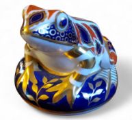 A Royal Crown Derby paperweight,  of a Frog, silver stopper