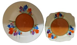 A Clarice Cliff Bizarre Crocus pattern shaped square side plate, brightly decorated with orange,