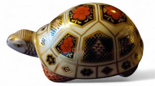 A  Royal Crown Derby paperweight, of a Tortoise, printed mark, gold stopper