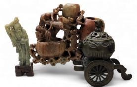 A Chinese green soapstone figure, of a elder, 14.5cm high, 20th century; a Chinese carved
