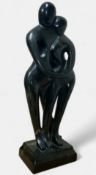 Manner of Henry Moore, carved granite sculpture 'Embrace', 32cm high
