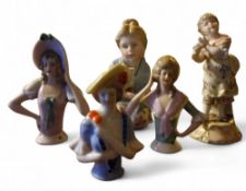 A continental porcelain pin cushion half doll, in 18th century dress; two others similar;  a