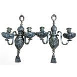 A pair of Sheffield plated two branch two light wall lights, campana shaped sconces, bold acanthus