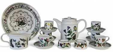 A set of six Portmeirion The Botanical Garden coffee cups and saucers, printed marks;    a similar