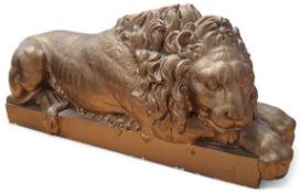 A composition gilt library model, of a lion, after Antonio Canova, the original sculpted for the