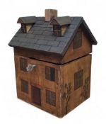 A novelty tea caddy, in the form of a house, 20cm high