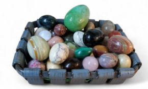 Specimen marble and hardstone eggs, including onyx, malachite, agate, rose quartz, the largest 10cm
