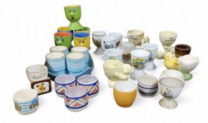 Eggcups - three Poole eggcups, geometrical, impressed marks;   a Keele St Sooty eggcup;   others,