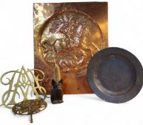 An Arts and Craft copper panel, embossed with roundel of George Slaying the Dragon, 58cm high,