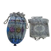 An early 20th century beadwork purse, with stylised flowers on a silver ground, 23cm high;