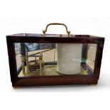 A 20th century barograph, mahogany glazed case, brass handle, 17cm high, 29.5cm wide