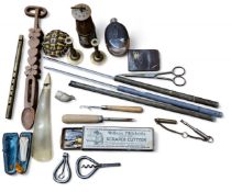 An early 19th century folding corkscrew, wire helix, c.1810;  a miniature miner's lamp;