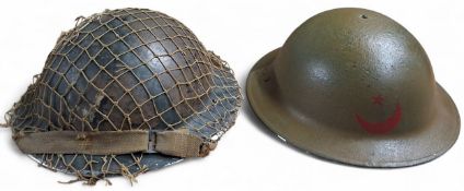 A WWII MkII Brodie helmet, green, stencilled red crecsent and star, Turkey? to front, liner and chin