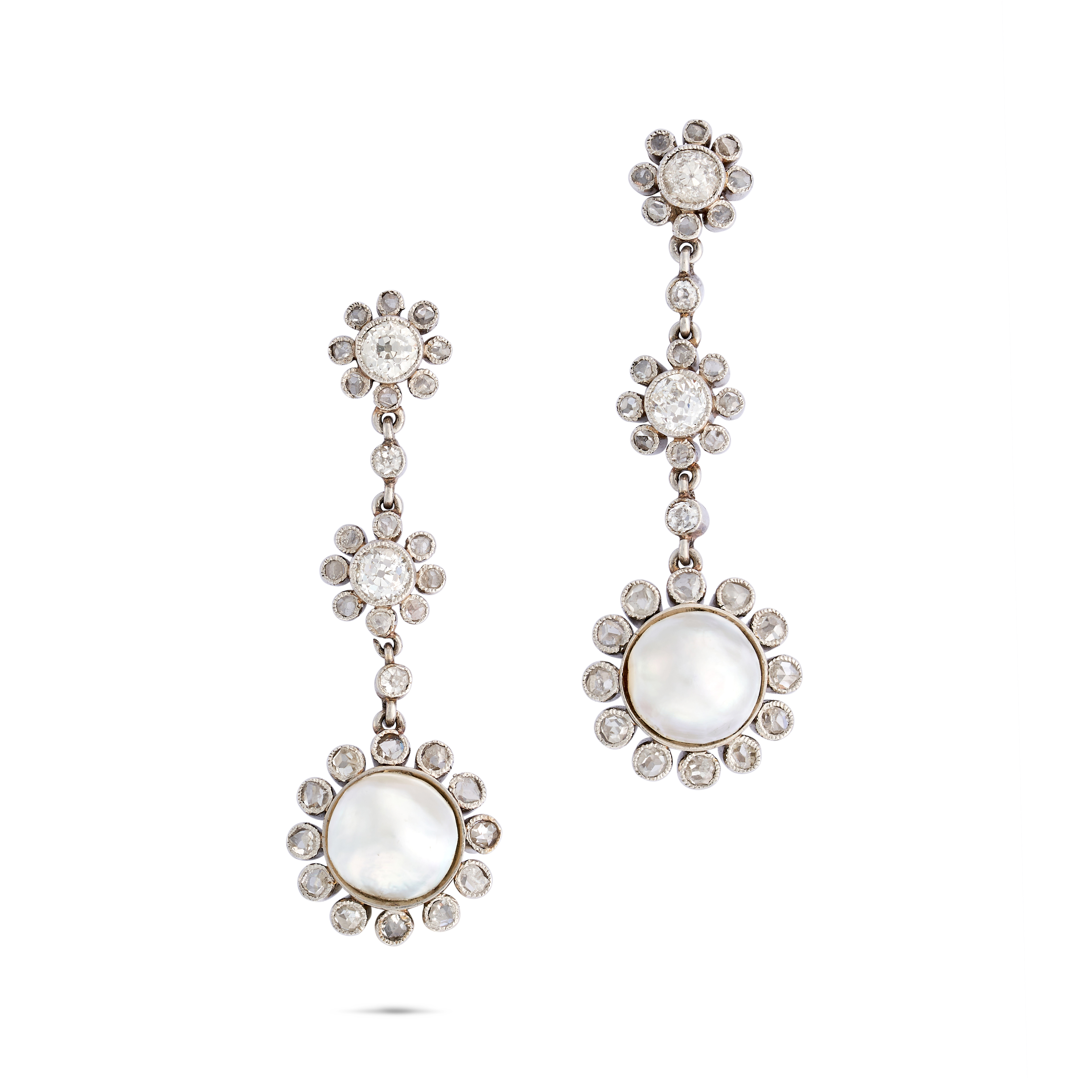 A PAIR OF NATURAL SALTWATER PEARL AND DIAMOND DROP EARRINGS each set with two old cut diamonds in...