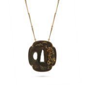 A RARE JAPANESE SHAKUDO TSUBA PENDANT NECKLACE the pendant set with a shakudo tsuba (handguard of
