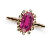 AN ANTIQUE 1.50 CARAT BURMA NO HEAT RUBY AND DIAMOND RING in yellow gold, set with a cushion cut