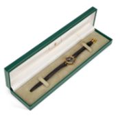 A LADY'S GUCCI STRAP WATCH