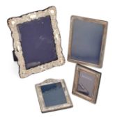 A GROUP OF FOUR SILVER-MOUNTED PHOTOGRAPH FRAMES