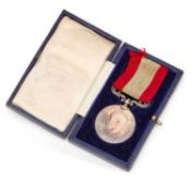 A GEORGE V LONG SERVICE ROCKET APPARATUS MEDAL