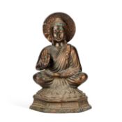 A LARGE PATINATED METAL FIGURAL BUDDHA